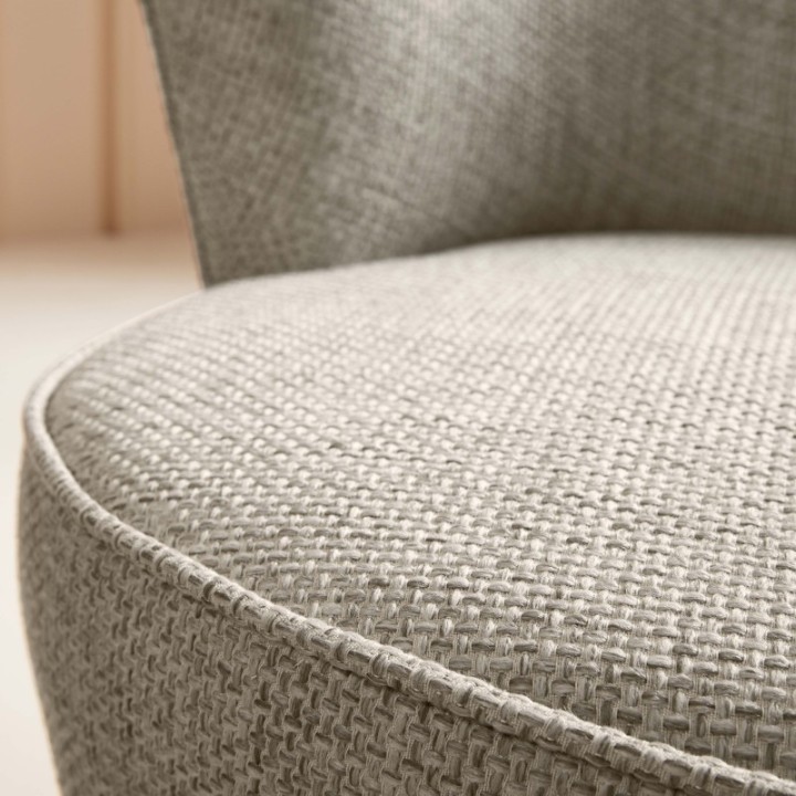 Fauteuil pivotant en tissu esprit scandinave