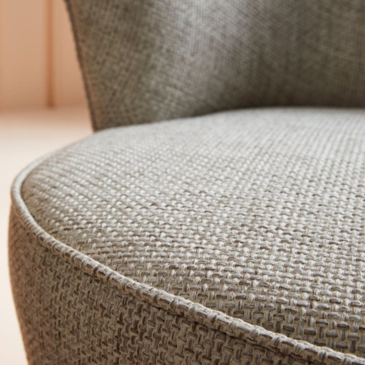Fauteuil pivotant en tissu esprit scandinave